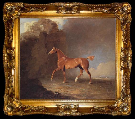 framed  Benjamin Marshall A Golden Chestnut Racehorse by a Rock Formation With a Town Beyond, ta009-2